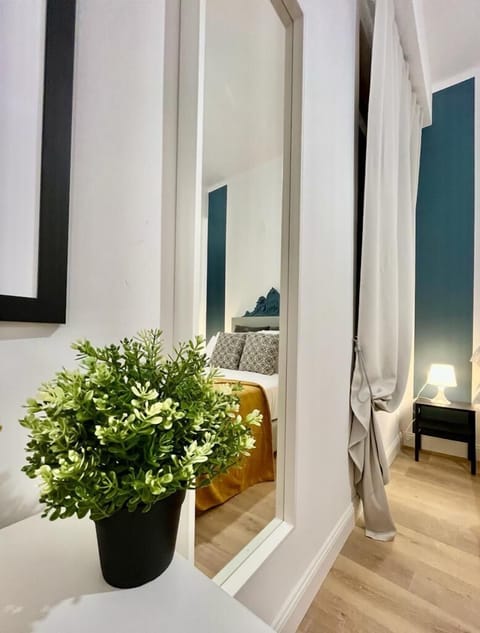 Family Apartment | Down comforters, desk, laptop workspace, blackout drapes