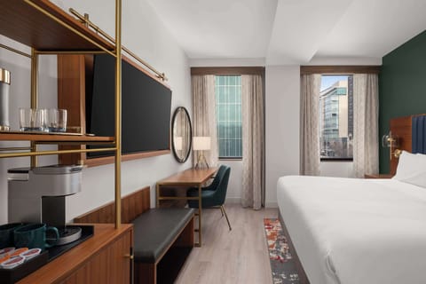 Premium bedding, down comforters, in-room safe, desk