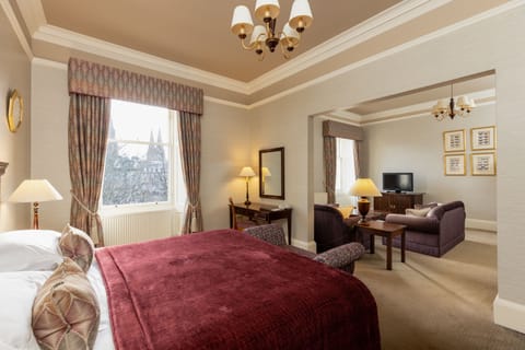 Grand Suite | Premium bedding, in-room safe, desk, iron/ironing board