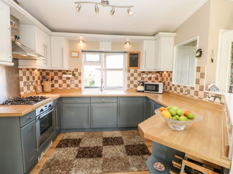 Fridge, electric kettle, toaster, cookware/dishes/utensils