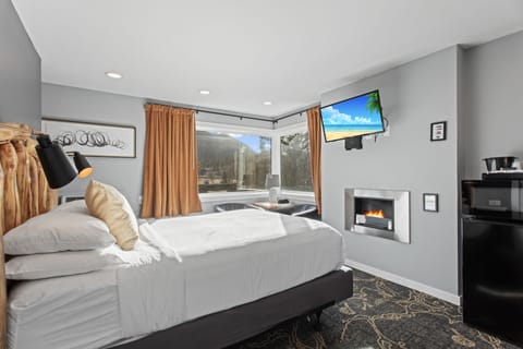 Balcony Queen | Laptop workspace, blackout drapes, iron/ironing board