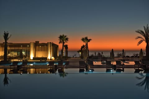Indoor pool, 5 outdoor pools, open 9:00 AM to 6:00 PM, pool umbrellas