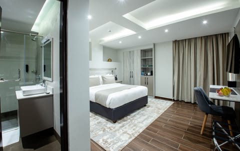 Deluxe Room | In-room safe, blackout drapes, soundproofing, iron/ironing board