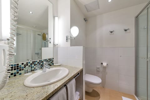 Shower, eco-friendly toiletries, hair dryer, bathrobes