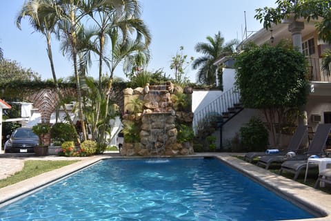 2 outdoor pools, sun loungers