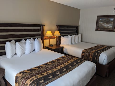 Pillowtop beds, desk, blackout drapes, iron/ironing board