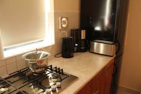 Apartment, 2 Bedrooms | Private kitchenette | Full-size fridge, microwave, dishwasher