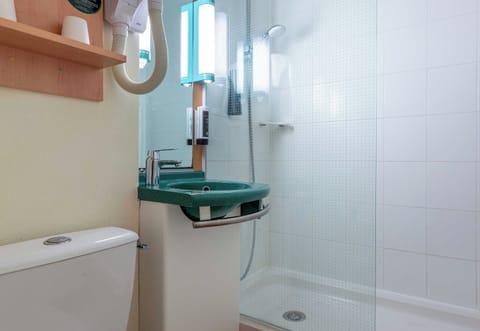 Shower, eco-friendly toiletries, hair dryer, towels