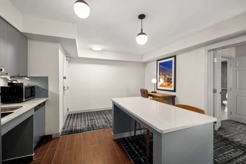 Fridge, microwave, coffee/tea maker, cookware/dishes/utensils