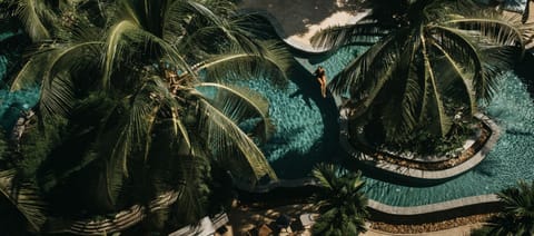 Outdoor pool, open 7:00 AM to 10:30 PM, free cabanas, pool umbrellas