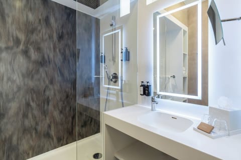 Shower, free toiletries, hair dryer, bathrobes