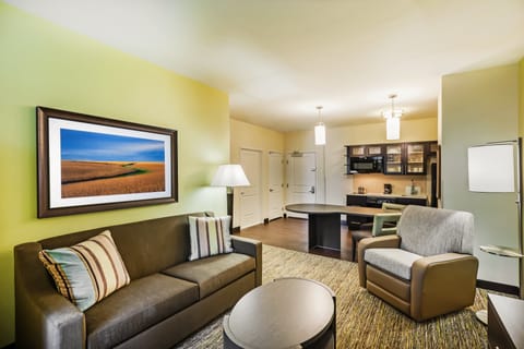 Suite, 1 Bedroom | Desk, blackout drapes, iron/ironing board, cribs (free)