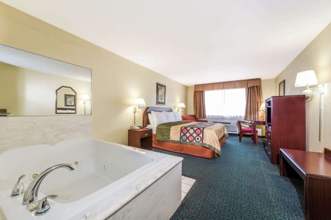 Suite, 1 King Bed | Iron/ironing board (on request), WiFi (free), alarm clocks, bed sheets