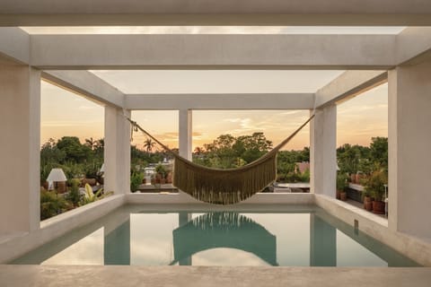 Outdoor pool, pool umbrellas, sun loungers