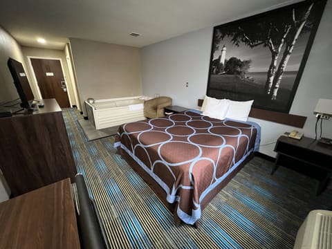 Deluxe Room, 1 Queen Bed, Non Smoking | Desk, blackout drapes, free cribs/infant beds, rollaway beds