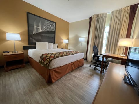 Desk, laptop workspace, blackout drapes, rollaway beds