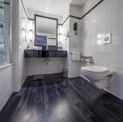 Eco-friendly toiletries, hair dryer, towels