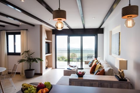 Superior Apartment, 1 Bedroom, Sea View, Ground Floor (Sin Acceso Spa) | Living room | TV