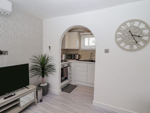 Fridge, electric kettle, toaster, cookware/dishes/utensils