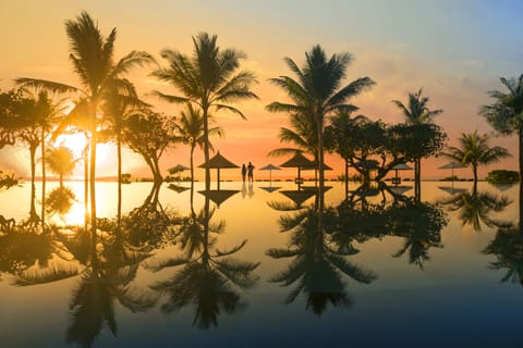 3 outdoor pools, open 7:00 AM to 9:00 PM, pool umbrellas, sun loungers