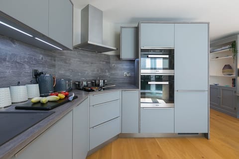 Fridge, dishwasher, electric kettle, cookware/dishes/utensils