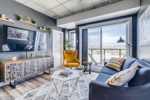 Deluxe Apartment | Living room | 65-inch Smart TV with digital channels, TV, Netflix