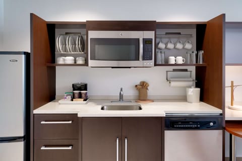 Fridge, microwave, coffee/tea maker, toaster