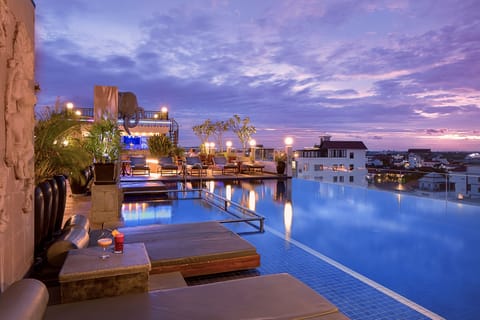 Outdoor pool, open 10:00 AM to 10:00 PM, pool umbrellas, sun loungers