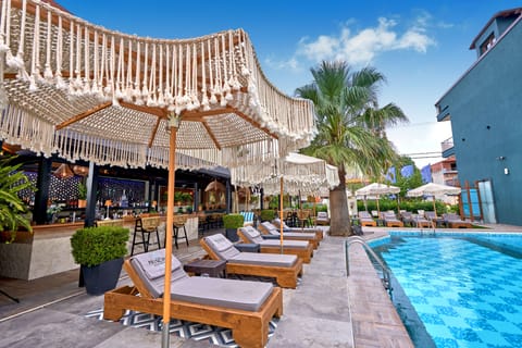Outdoor pool, open 9:00 AM to 8:30 PM, pool umbrellas, sun loungers