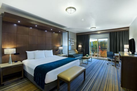 Riverview Balcony King Suite Sleeper Sofa | Premium bedding, desk, laptop workspace, blackout drapes