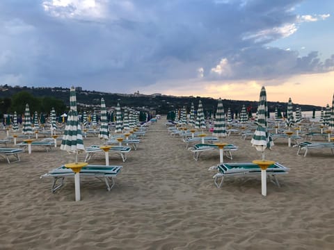 Private beach, sun loungers, beach umbrellas
