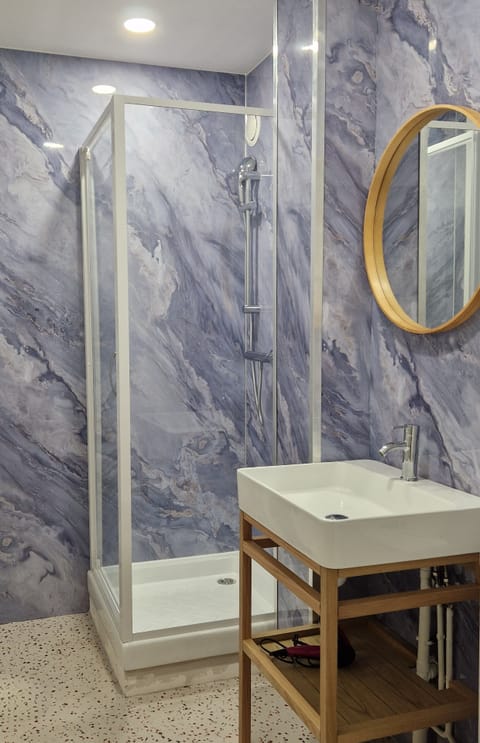 Double Room, Air conditioning, Garden View | Bathroom | Free toiletries, hair dryer, towels, soap