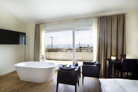 Junior Double Room, Bathtub, Lake View | Premium bedding, in-room safe, individually decorated, desk