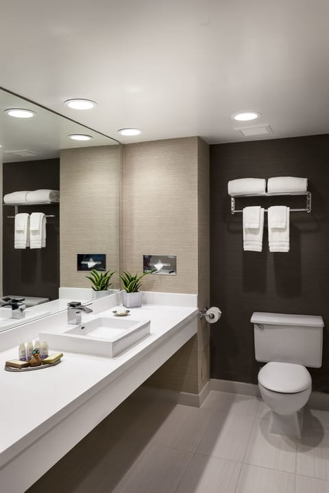 Combined shower/tub, designer toiletries, hair dryer, bathrobes