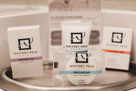 Combined shower/tub, designer toiletries, hair dryer, bathrobes