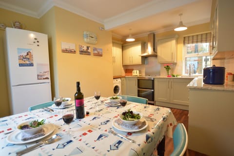 Fridge, dishwasher, cookware/dishes/utensils