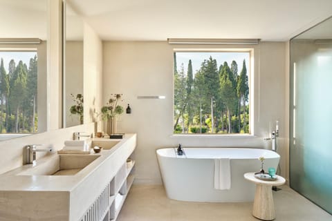 Suite, 1 Bedroom, Pool View | Bathroom | Designer toiletries, hair dryer, bathrobes, slippers