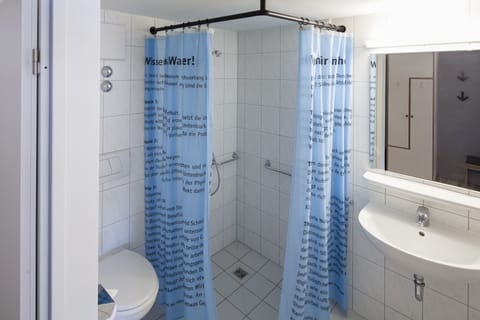 Shower, towels, toilet paper