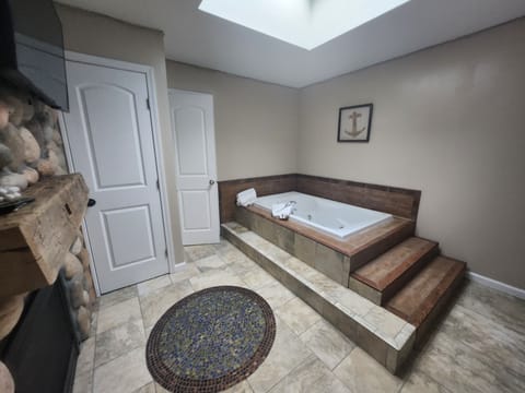 Thematic Design Suite | Bathroom | Shower, rainfall showerhead, hair dryer, bathrobes