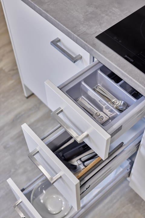 Full-size fridge, microwave, stovetop, coffee/tea maker