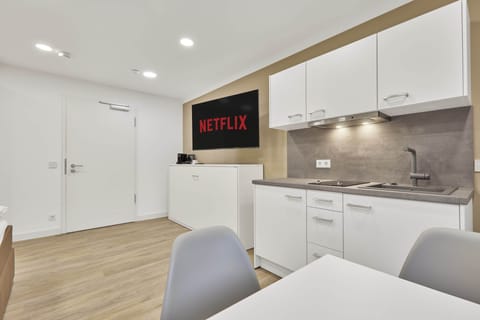 50-inch Smart TV with satellite channels, TV, Netflix