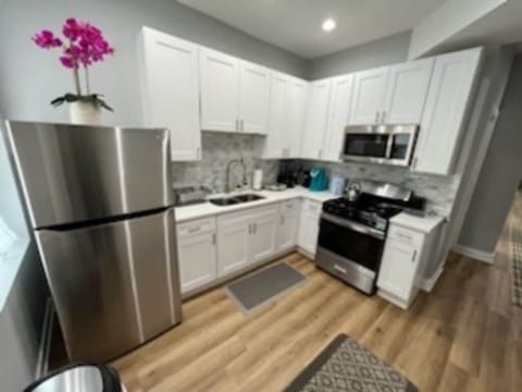 Deluxe Duplex (Second Floor) | Private kitchen | Oven, cookware/dishes/utensils, freezer
