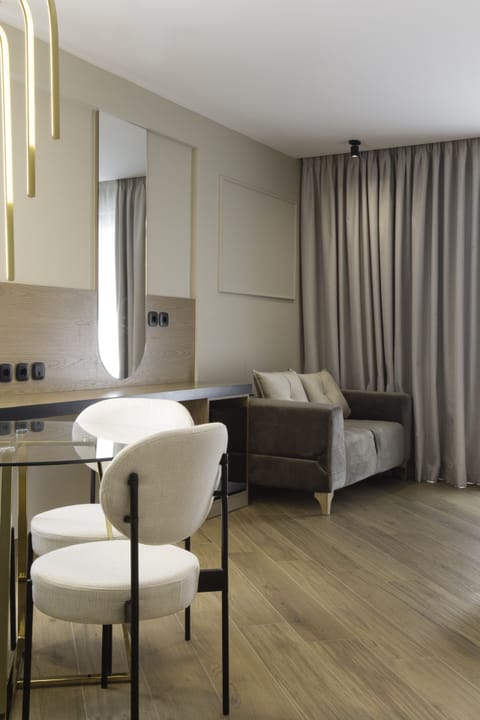 Deluxe Suite, Sea View | Living area | 32-inch Smart TV with satellite channels, TV