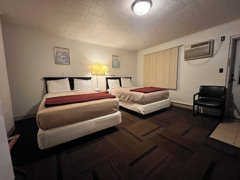 Room, 2 Double Beds | Iron/ironing board, free WiFi, bed sheets