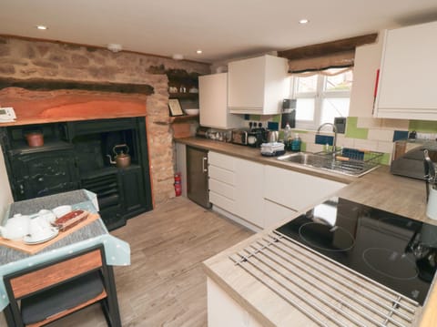 Fridge, electric kettle, toaster, cookware/dishes/utensils