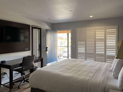 Desk, laptop workspace, free WiFi, bed sheets