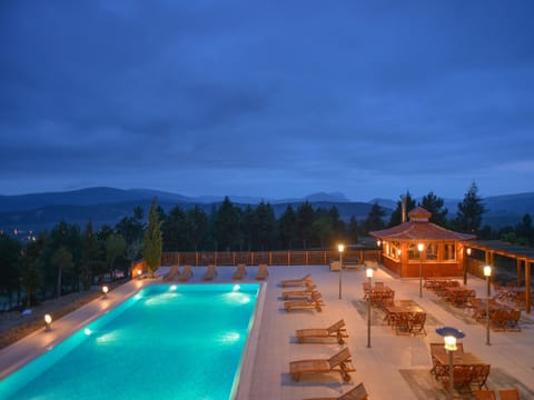 Indoor pool, outdoor pool, pool umbrellas, sun loungers
