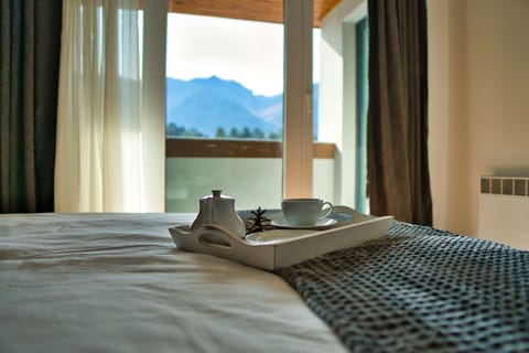 Suite, Multiple Beds, Non Smoking, Kitchenette (with Sofabed) | Iron/ironing board, free WiFi, bed sheets