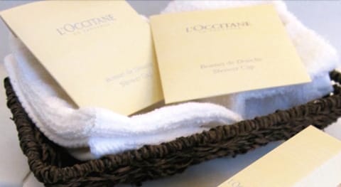 Bathtub, hair dryer, bathrobes, slippers