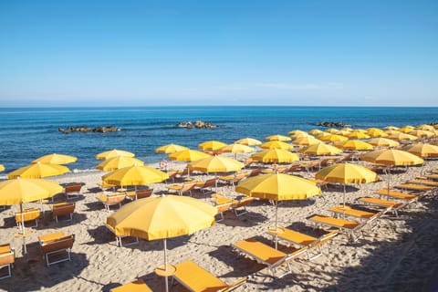 Private beach, sun loungers, beach umbrellas, beach towels